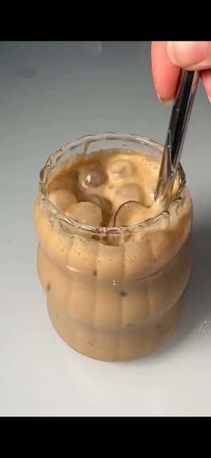 Stirred Iced Honey Latte Close-Up preview