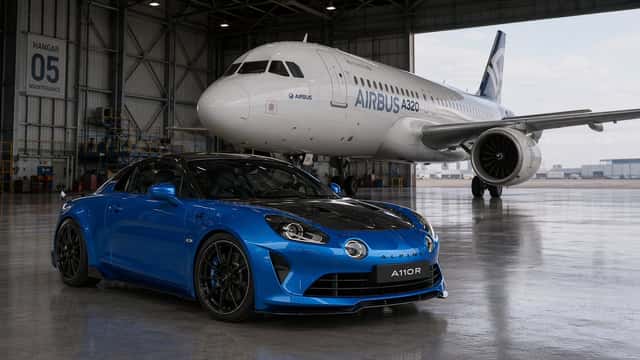 Sports Car and Airliner in Hangar preview