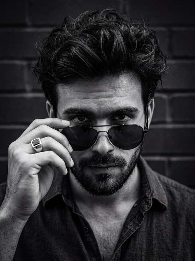 High-contrast black and white intense male portrait preview