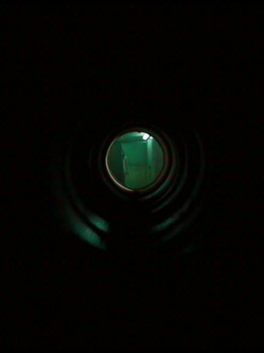 Video Prompt for FPV Drone Shot Through a Pipe