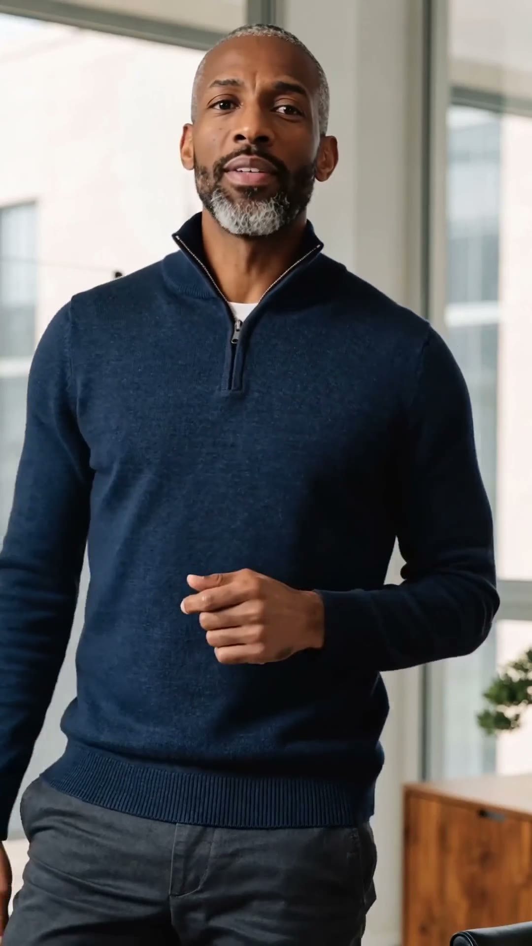 Man presenting in a modern office