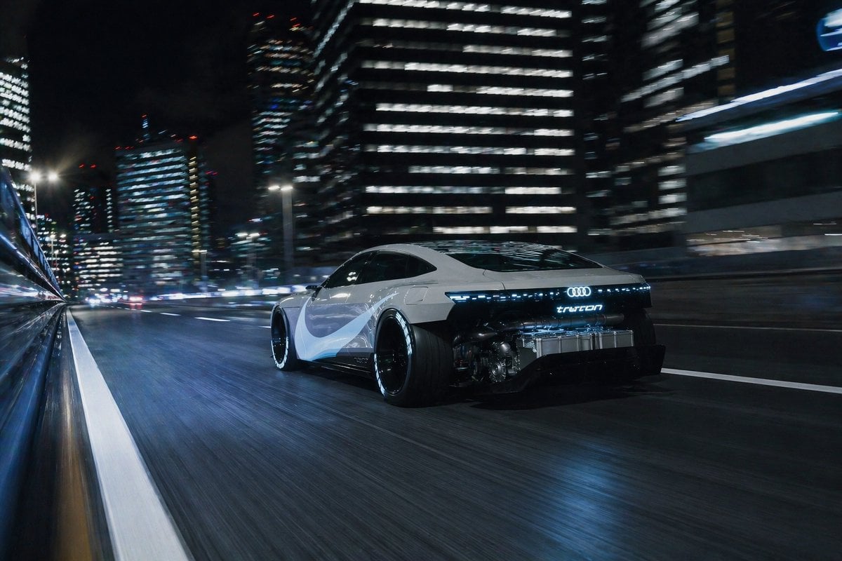 Futuristic EV Racing Through City Night