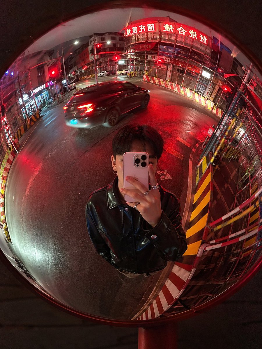 AI-generated sample for “Convex Street Mirror at Night”