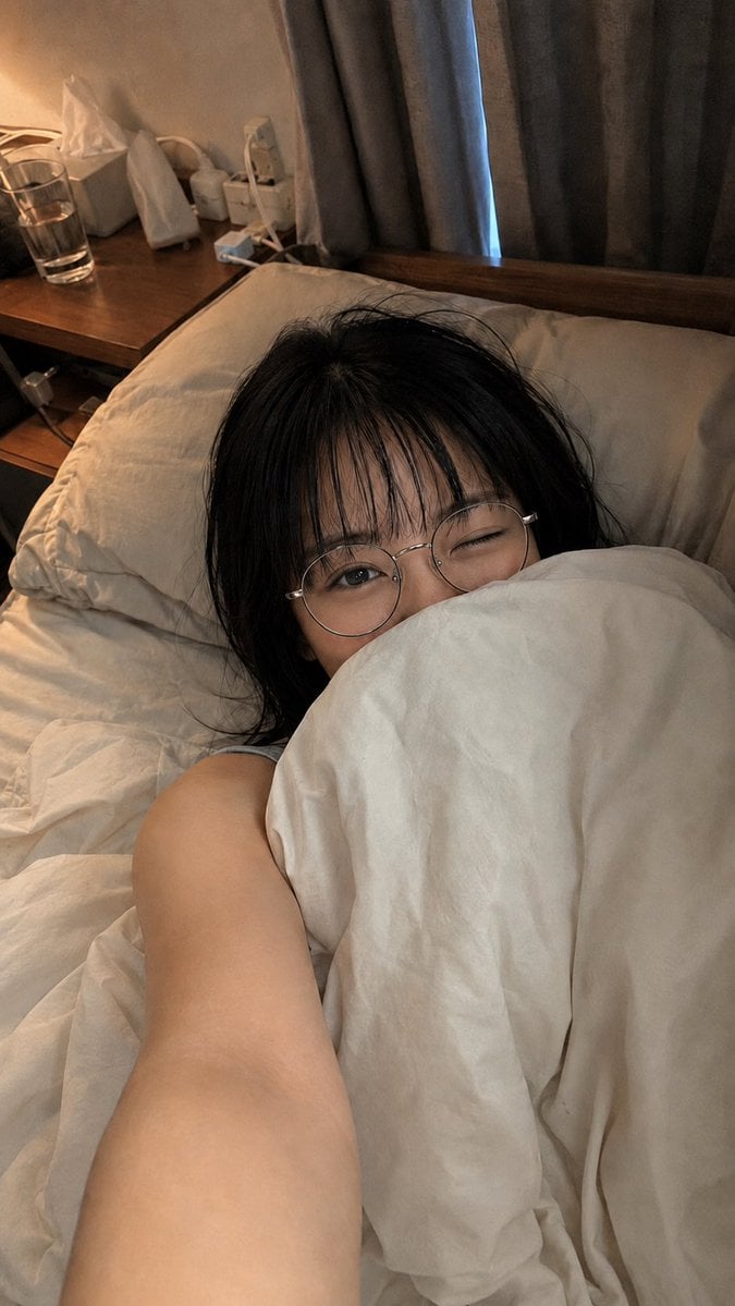 Adjust Glasses Placement in Bed Selfie reference image 1