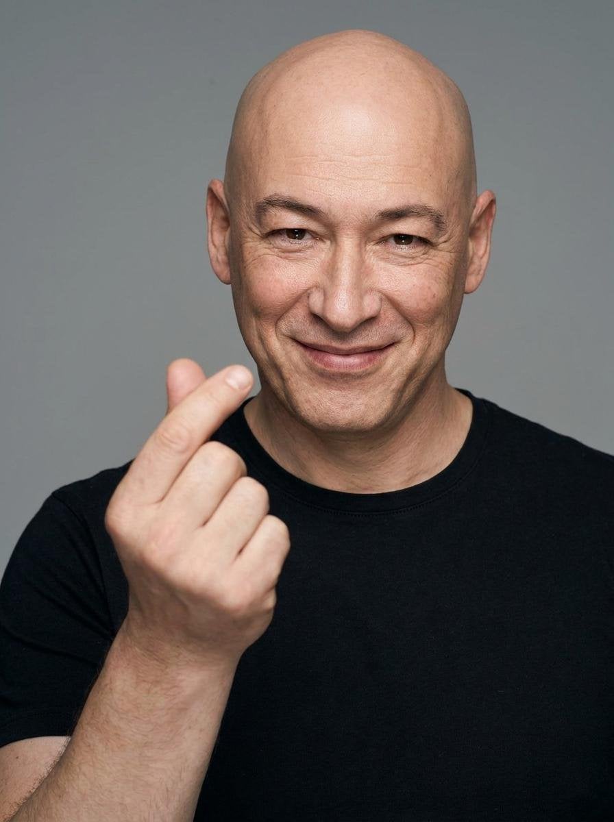Studio Portrait with Finger Heart Gesture