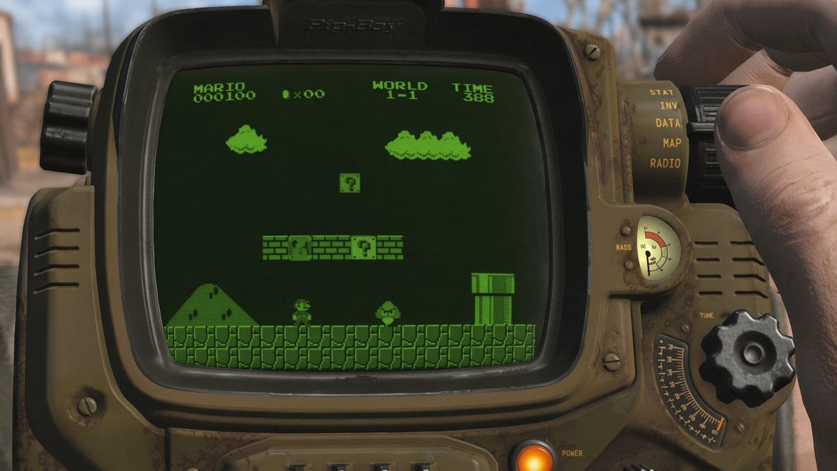 Retro Wrist Computer Playing Classic Platformer reference image 1