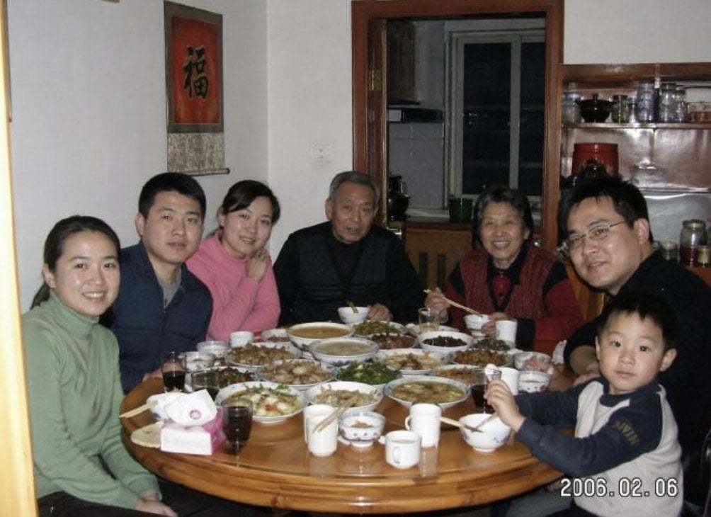 Anonymized 2000s Family Dinner Photo