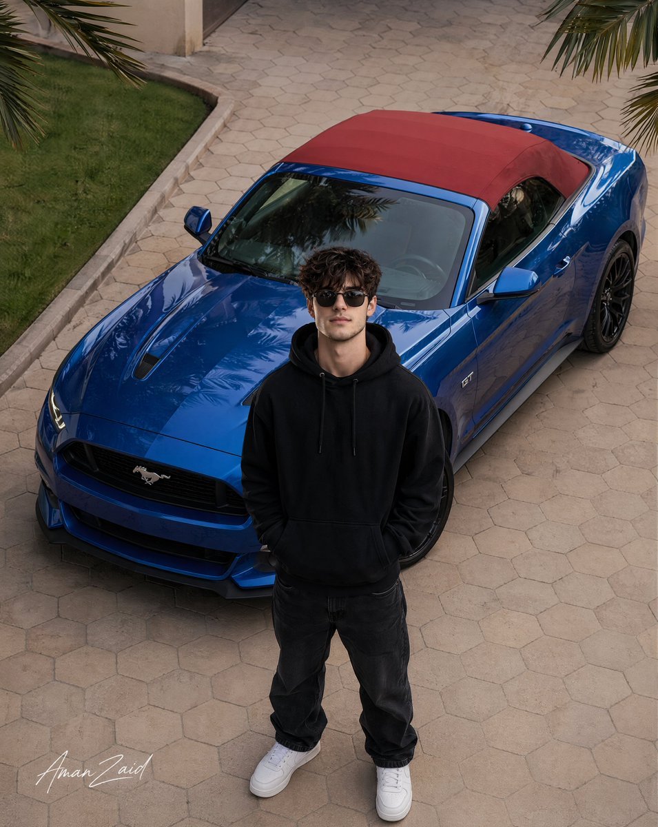 Cinematic portrait of a man with a Ford Mustang