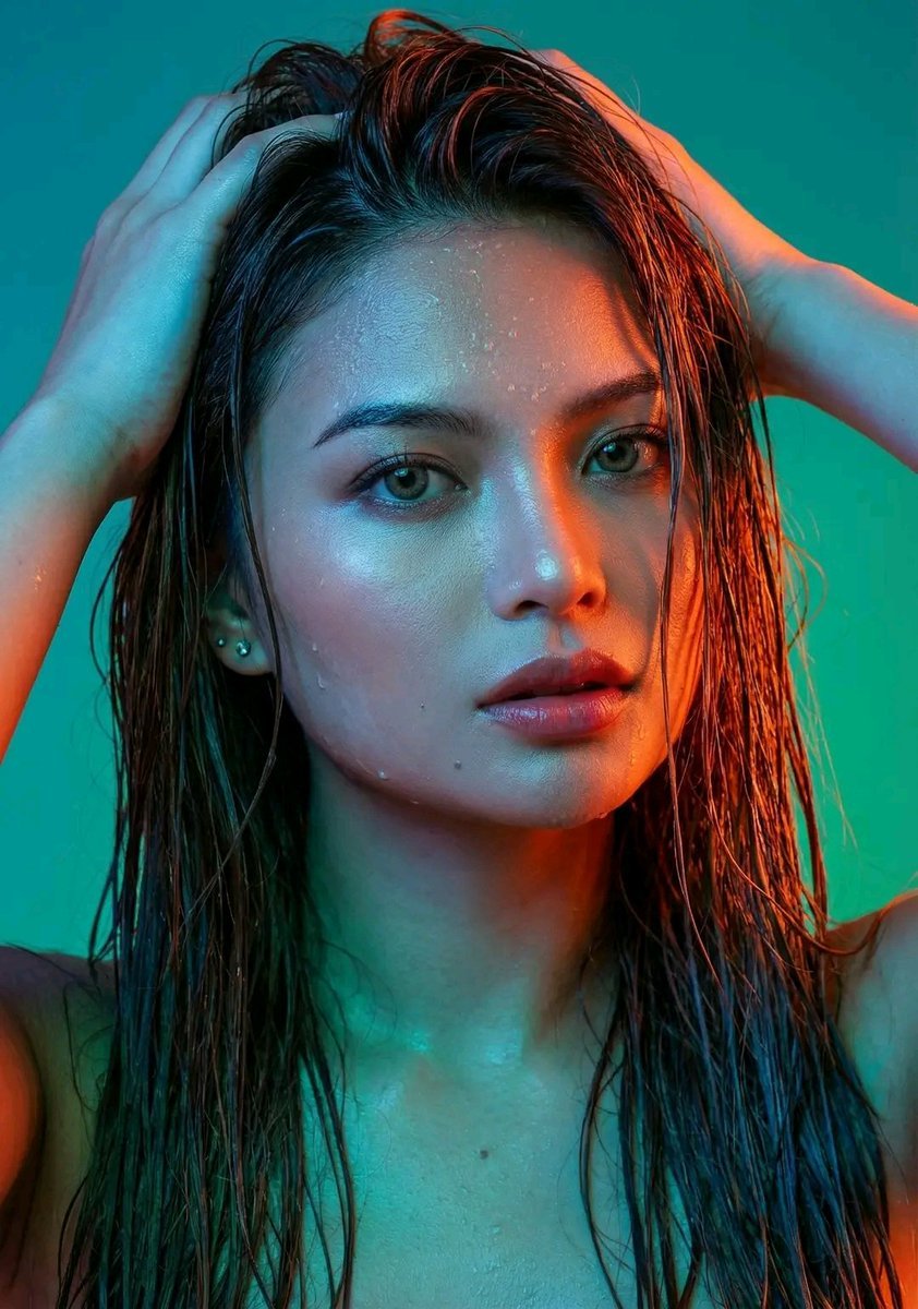 Dramatic Neon Portrait with Wet Hair and Color Contrast